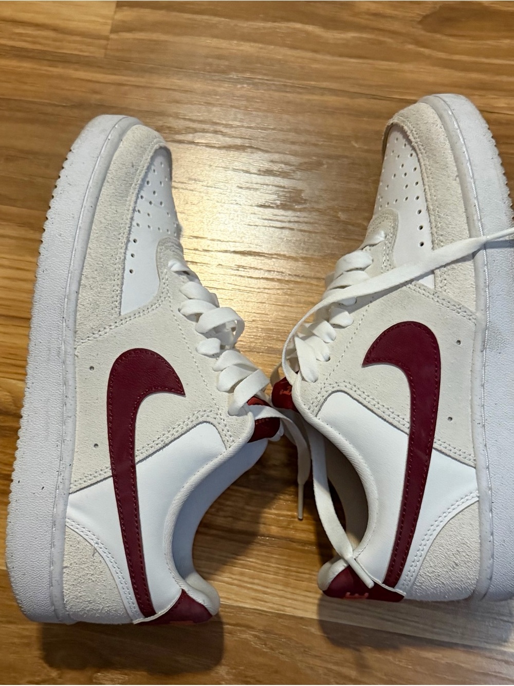 Nike Women’s Low-Top Sneakers in White with Maroon Swoosh